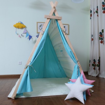 Beautiful children outdoor camping teepee tent